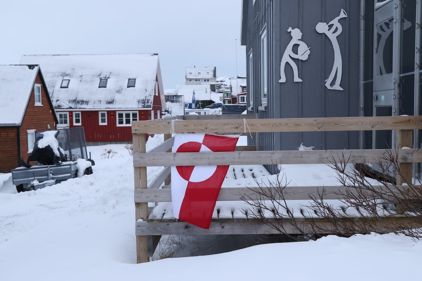 The flag of Greenland hung from the terrace of a house in Nuuk, Greenland.
