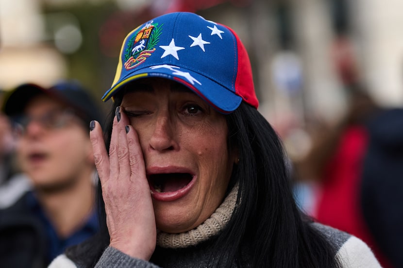 Venezuelan Mariana Silva attends a celebration in downtown Madrid after U.S. President...