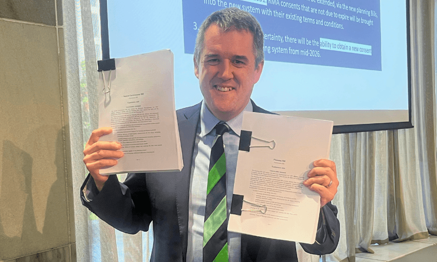 RMA minister Chris Bishop hold the Planning and Natural Environment Bills.
