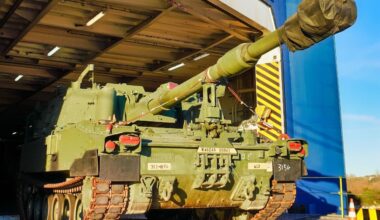 A U.S. M109 Paladin howitzer drives off the vessel Liberty Peace during offloading operations at the port of Koper, Slovenia on December 28, 2024. This Reception, Staging, and Onward Movement (RSOM) operation in the port of Koper is bringing in 1-3ID, the next Regionally Aligned Force (RAF), into the European Theater. These forces will be then transported by the 21st Theater Sustainment Command to their forward operating sites across NATO where they will conduct interoperability training with Allies and partners. The intent of these RAFs is to assure our allies and deter all adversaries.