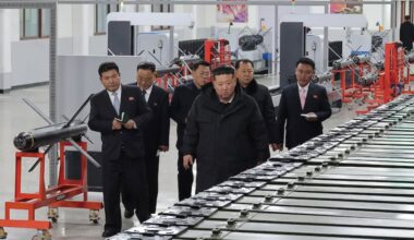 In this photo provided by the North Korean government, its leader Kim Jong Un, front right, visits a major munitions factory at an undisclosed place in North Korea Saturday, Jan. 3, 2026.