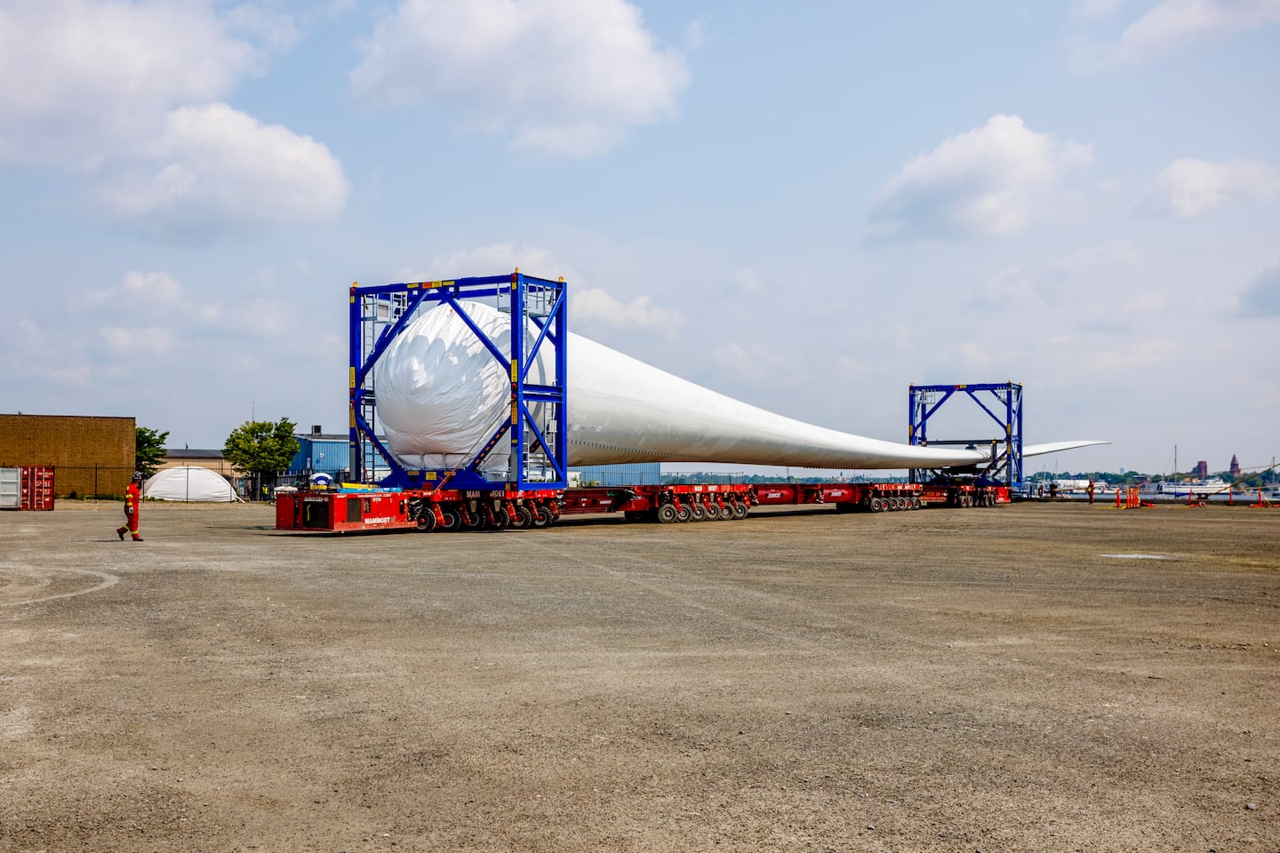 Workers moved turbine blades for the Vineyard Wind offshore facility at the New Bedford Marine Commerce Terminal in New Bedford on June 7, 2023.
