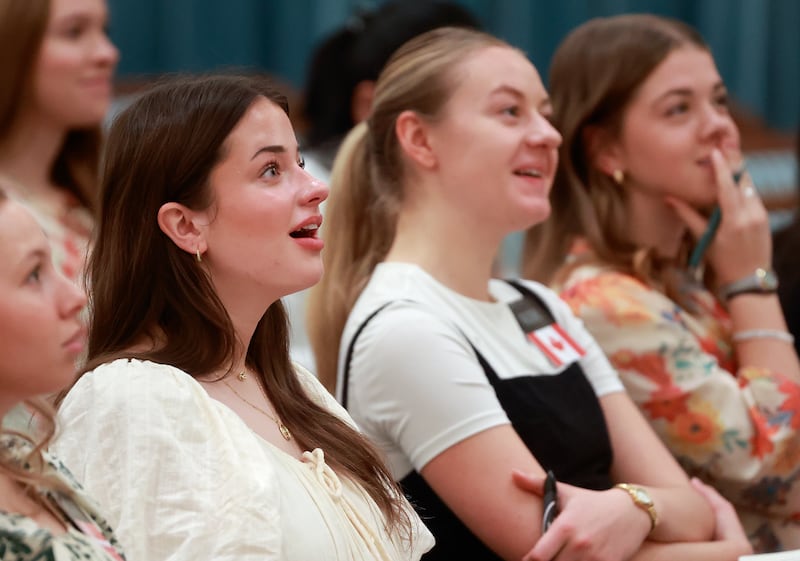 Sister missionaries react to an announcement that they will be reassigned from the Utah Salt Lake City Temple Square Mission to another nearby mission in Utah during a missionary devotional at the Joseph Smith Memorial Building in Salt Lake City on Friday, Jan. 9, 2026.