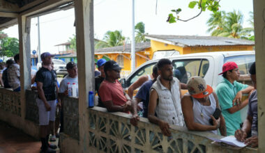 Hopeful yet wary, Venezuelans across Latin America mull going home