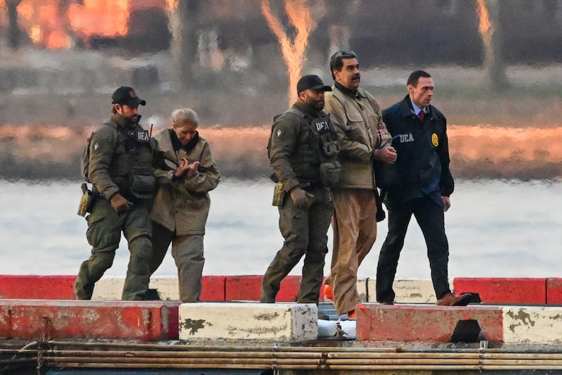 Captured Venezuelan president Nicolas Maduro and his wife, Cilia Flores, arrive at the Wall Street Heliport during their transport to the federal courthouse for their arraignment in New York. Photograph: EPA