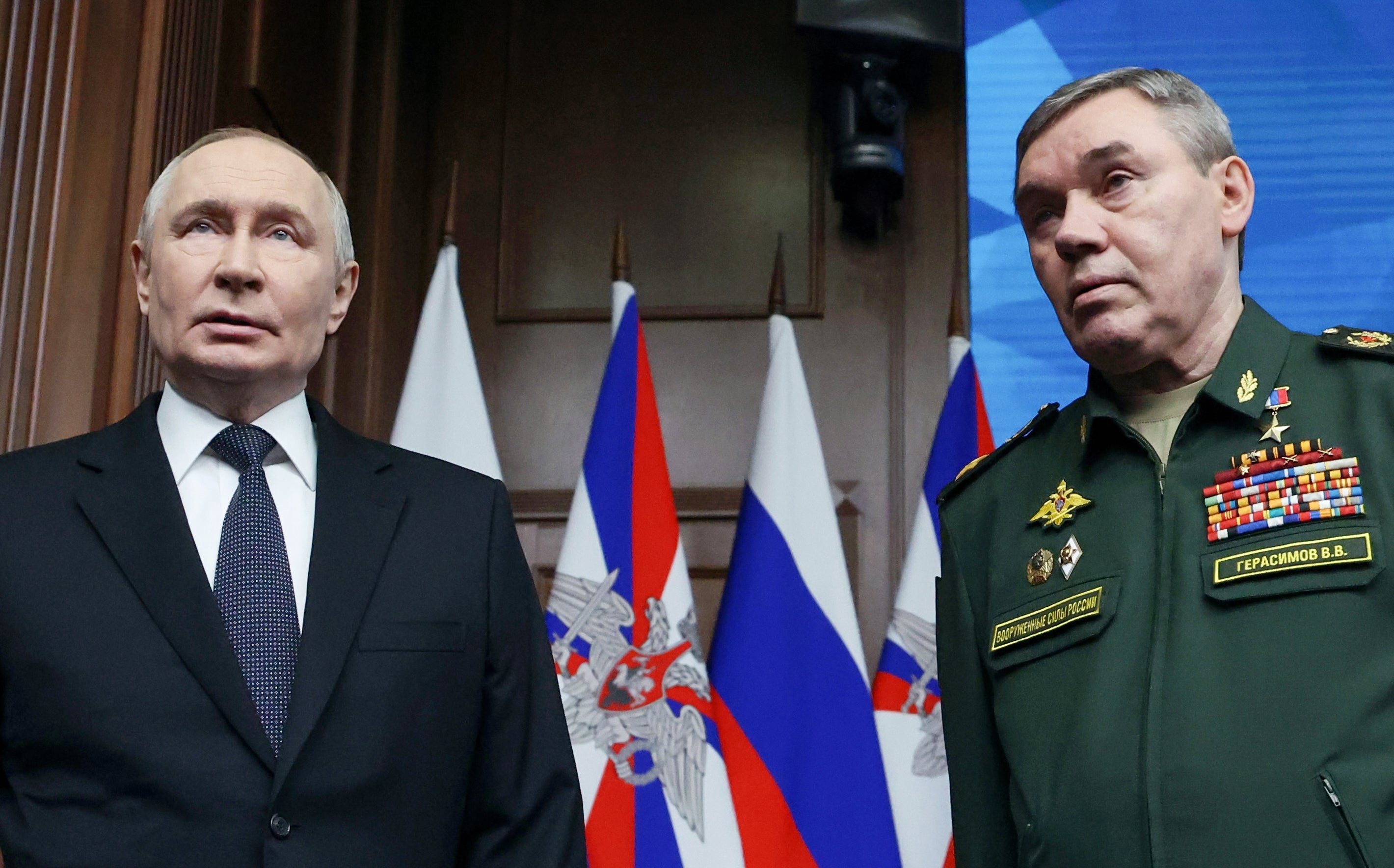 Russian president Vladimir Putin and Russian Chief of General Staff General Valery Gerasimov attend the annual board meeting of the country's Defense Ministry and awards soldiers in Moscow