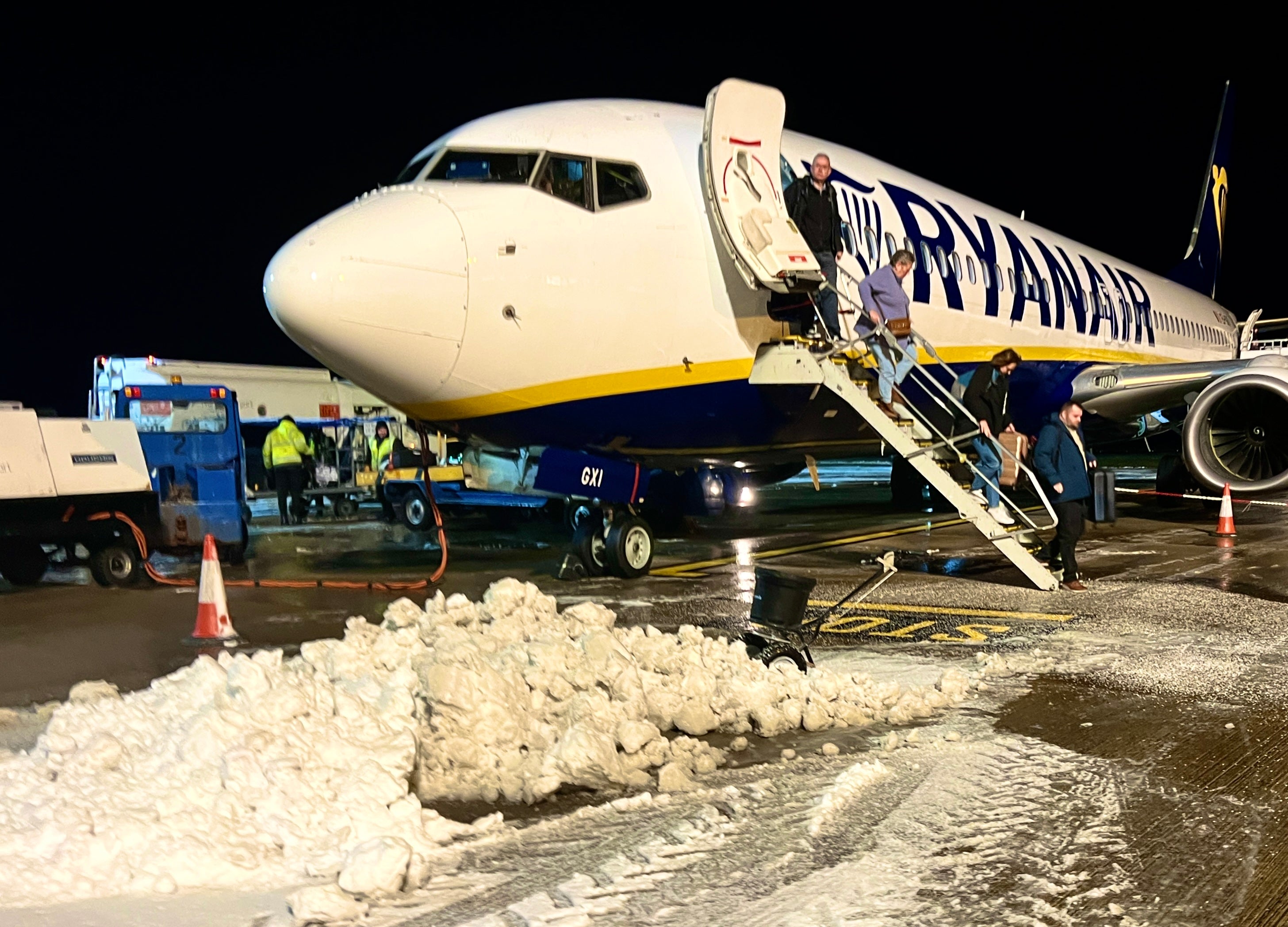Freeze frame: Ryanair passengers from Alicante arriving at a snow-covered Norwich airport