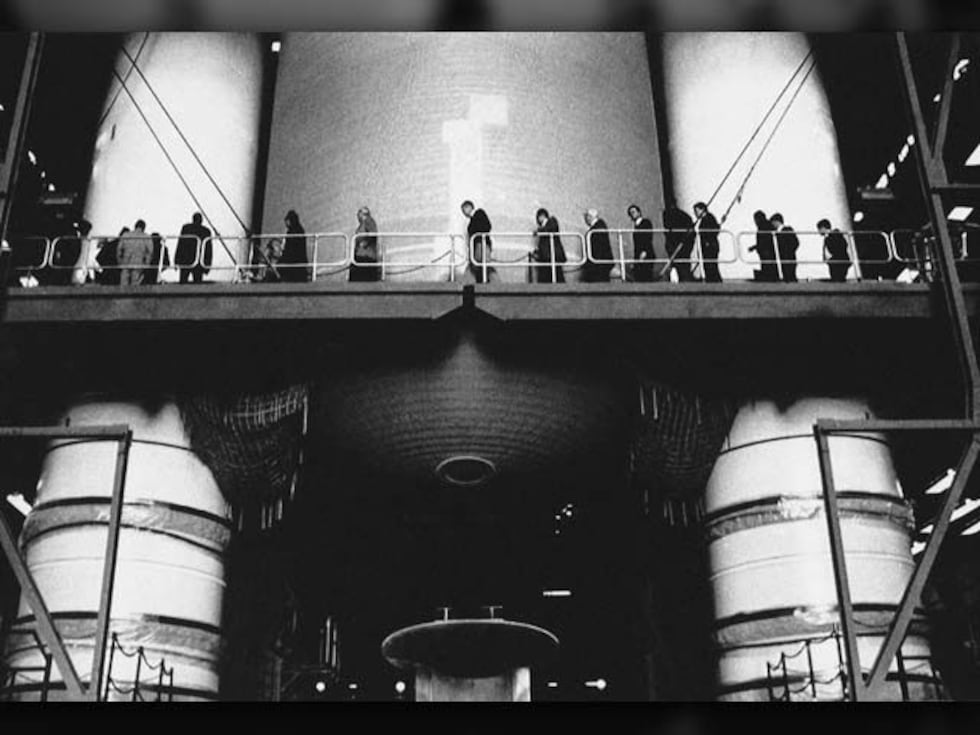 Members of the Presidential Commission on the Space Shuttle Challenger Accident walk past the...