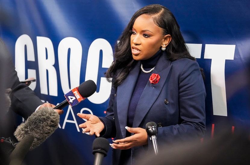 U.S. Rep. Jasmine Crockett addresses reporters after a rally where she announced she is...