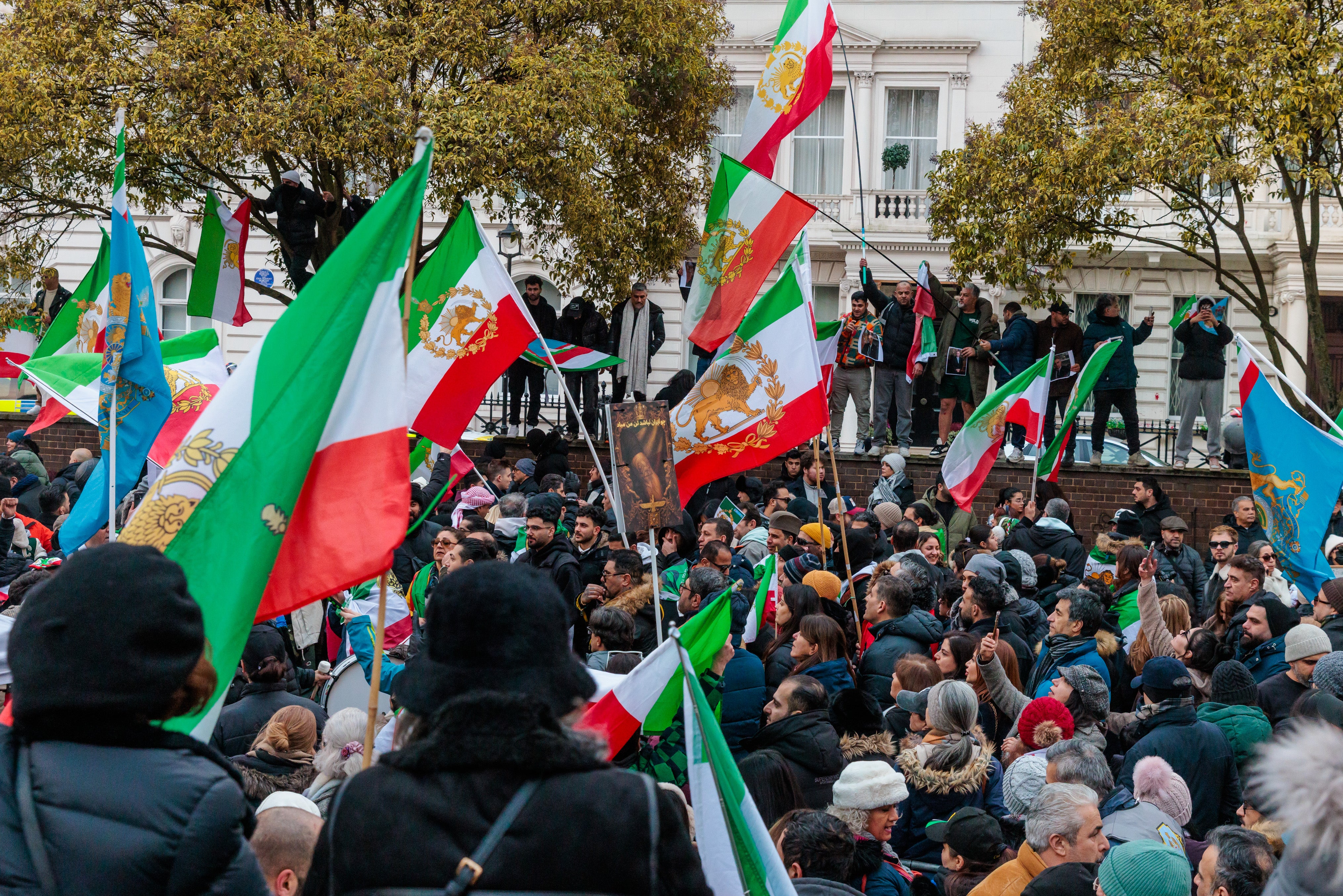 Members of the Iranian community filled the road opposite the Iranian Embassy in London on Saturday