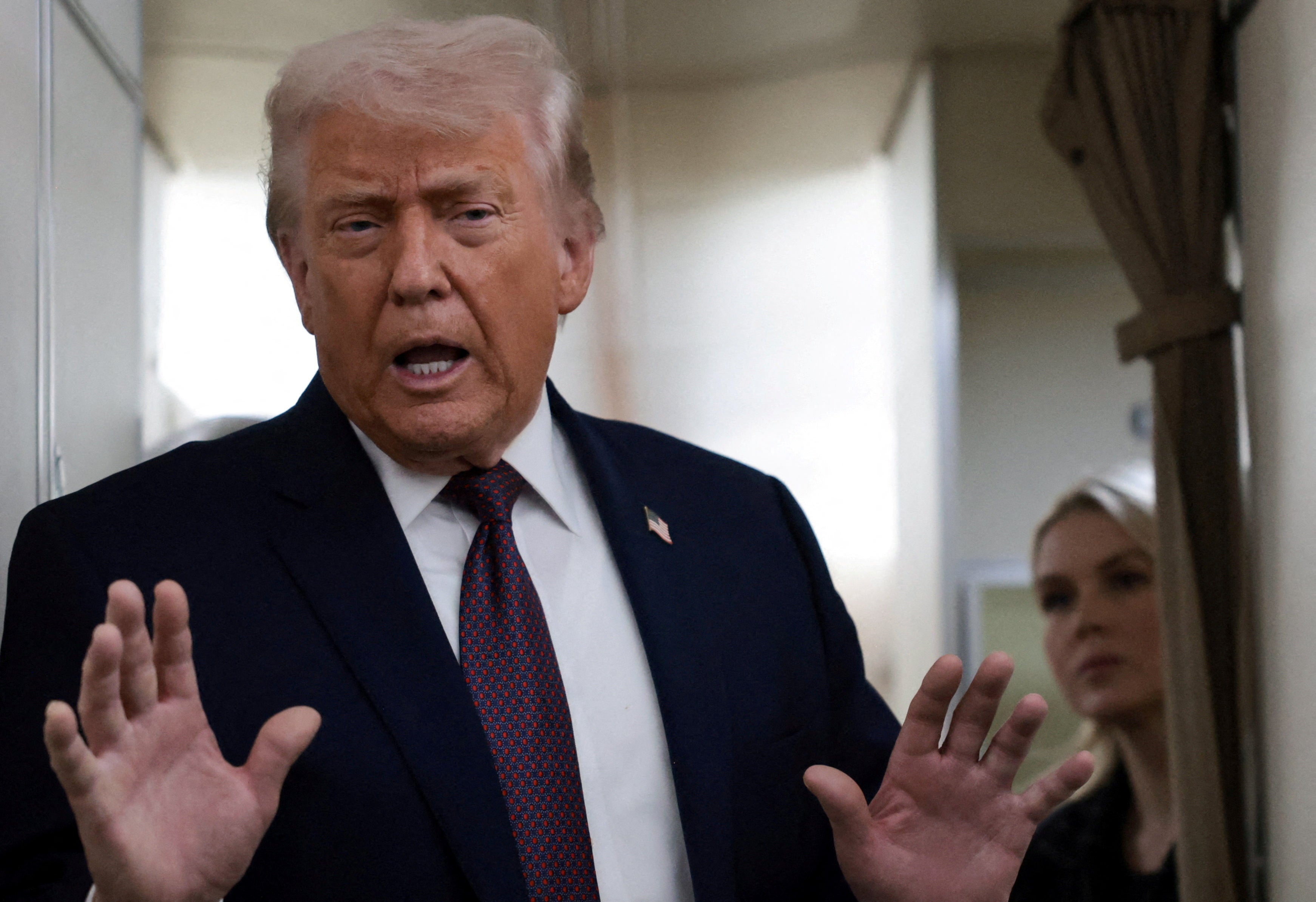 President Donald Trump speaks to reporters