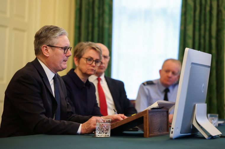 Prime Minister Sir Keir Starmer sits with Foreign Secretary Yvette Cooper, Defence Secretary John Healey and Chief of the Defence Staff Richard Knighton as he co-chairs a virtual call with members of the Coalition of the Willing, the countries prepared to offer support to Ukraine as efforts continued to find a peace deal to end the war with Vladimir Putin's Russia. Picture date: Tuesday November 25, 2025. PA Photo. Talks were held between US and Ukraine representatives in Geneva over the weekend about the peace plan which had been set out by Donald Trump's administration following discussions with Russia. Ukraine and its European allies had pushed back against the 28-point plan which contained significant concessions to Moscow. Photo credit should read: Toby Melville/PA Wire