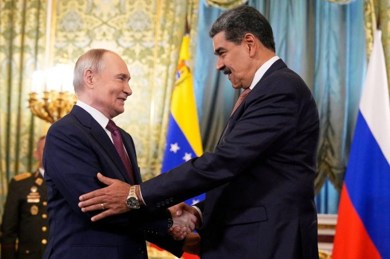FILE PHOTO: Russian President Vladimir Putin welcomes his Venezuelan counterpart Nicolas Maduro during a meeting at the Kremlin in Moscow, Russia, May 7, 2025. Alexander Zemlianichenko/Pool via REUTERS/File Photo