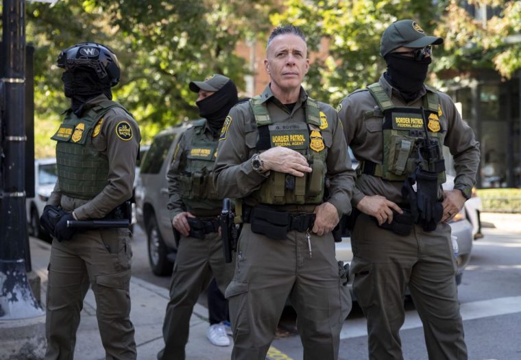 U.S. Border Patrol Cmdr. Gregory Bovino stands with other federal agents near the Newberry Library in Chicago??s Gold Coast on Sept. 28, 2025, as part of a show of force in the downtown area. (Brian Cassella/Chicago Tribune/Tribune News Service via Getty Images)