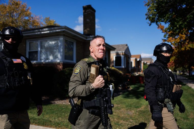 Border Patrol Cmdr. Gregory Bovino walks with agents conducting immigration enforcement sweeps in the Edison Park neighborhood on Oct. 31, 2025, in Chicago. (Armando L. Sanchez/Chicago Tribune/Tribune News Service via Getty Images)