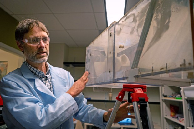 Dr. Peter Scott Weiss-Penzias of UC Santa Cruz holding an active fog collector in his lab in UC Santa Cruz, Calif. on Nov. 6, 2025. (Photo by Daniella Garcia Almeida)