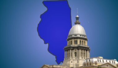 The state capital in front of Illinois on a blue background.