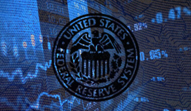 Federal Reserve logo with blue charts in background