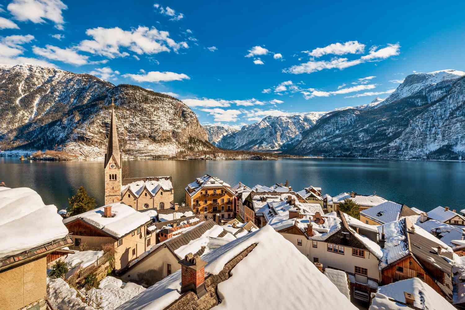This Postcard-perfect European Village Has Cozy Inns, Dramatic Mountain Views, and the World’s Oldest Salt Mine
