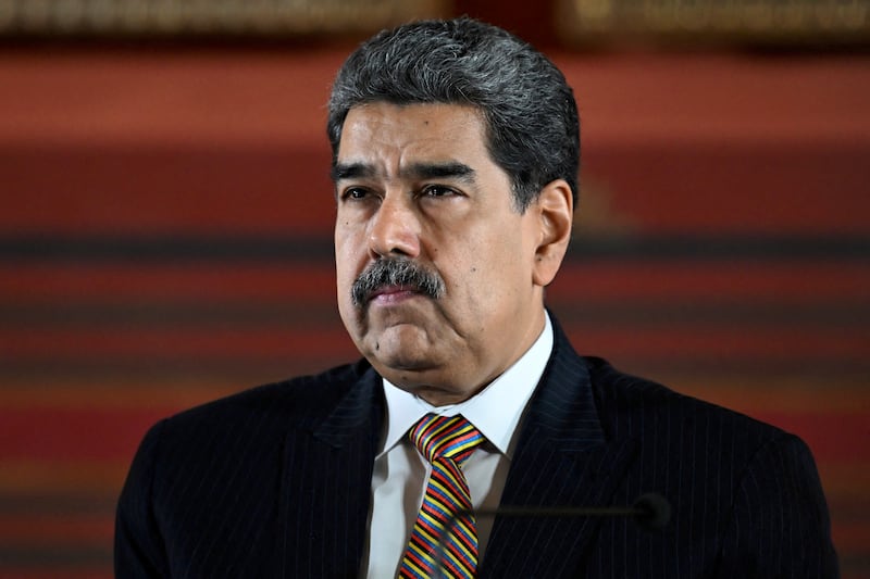 Venezuela's President Nicolas Maduro looks on during a meeting at the National Assembly in Caracas on August 22, 2025.