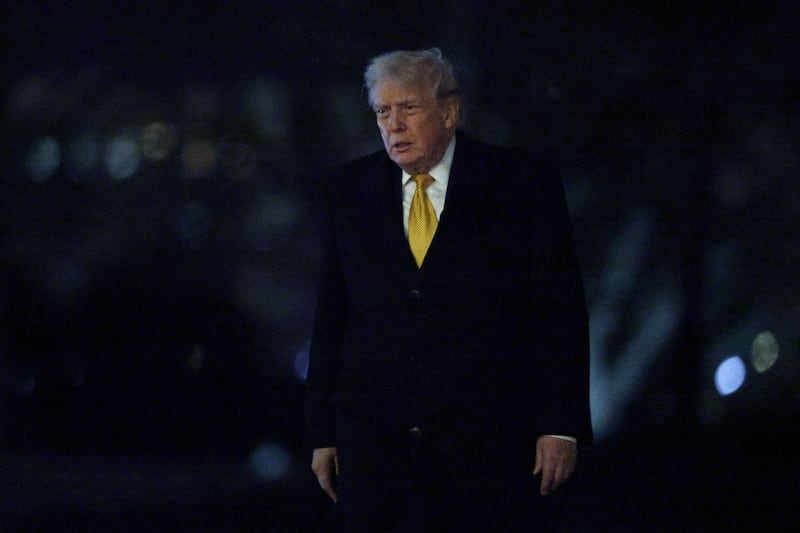 WASHINGTON, DC - JANUARY 04: U.S. President Donald Trump walks on the South Lawn after landing at the White House on January 4, 2026, in Washington, D.C. President Trump returned to Washington from his winter break at the Mar-a-Lago Club in Palm Beach, Florida, one day after U.S. forces captured former Venezuelan President Nicolas Maduro and his wife in a raid on his compound in the capital city of Caracas. (Photo by Alex Wong/Getty Images)