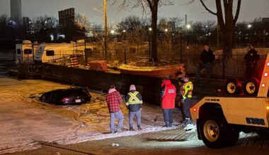 Vehicle slides into water in Mimico