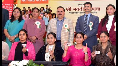 Uttar Pradesh chief electoral officer Navdeep Rinwa (in white coat) and others at an event on National Voters’ Day. (Sourced)