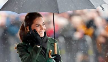Princess Kate on a rainy day holding an umbrella