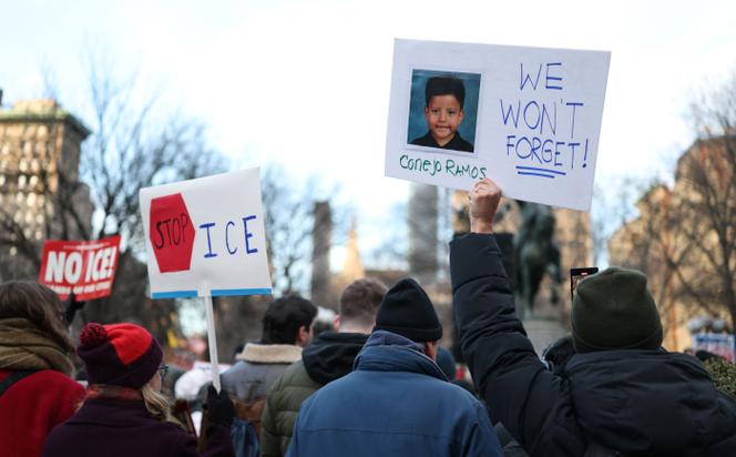 People hold a photo of Liam Conejo Ramos, 5, who was held by immigration officers, during an 'ICE Out' protest against US Immigration and Customs Enforcement (ICE) in New York on January 23, 2026.