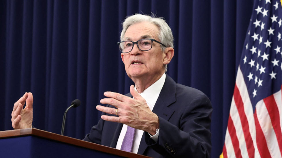 Wall Street lifts to records after shaking off Trump Fed feud worries