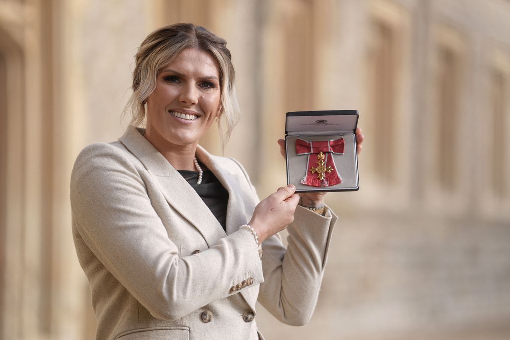 Lioness Millie Bright with her OBE