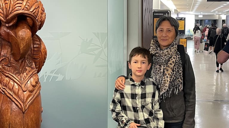 Austen and his grandmother at the airport. (Source: NZ Police)