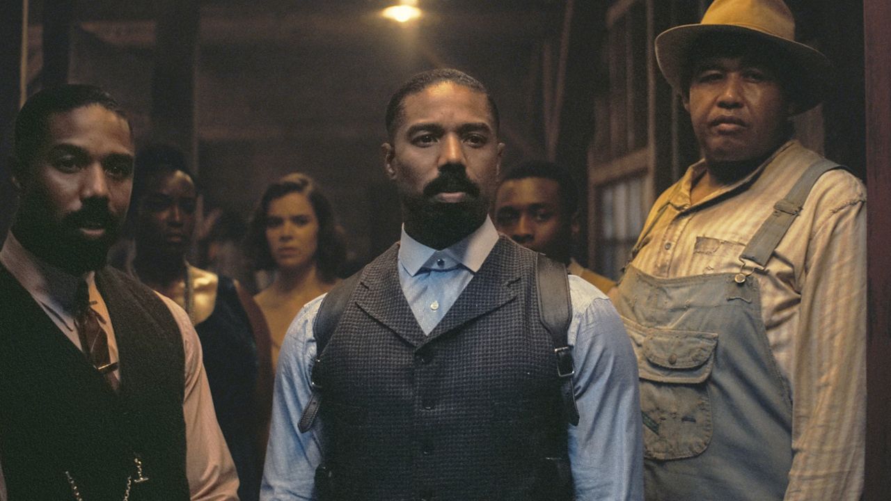 This image released by Warner Bros Pictures shows Michael B. Jordan, foreground from left, Michael B. Jordan and Omar Benson Miller in a scene from "Sinners." (Warner Bros. Pictures via AP)