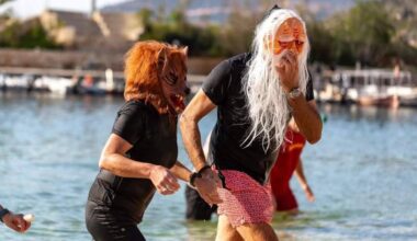 Foreign residents wearing eye-catching costumes swim and walk in the sea during New Year celebrations in Antalya’s Kas district, Türkiye, Jan. 2, 2026. (AA Photo)