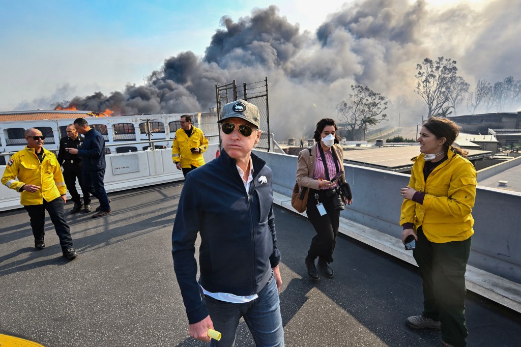 Governor Gavin Newsom surveys damage during the Palisades Fire.