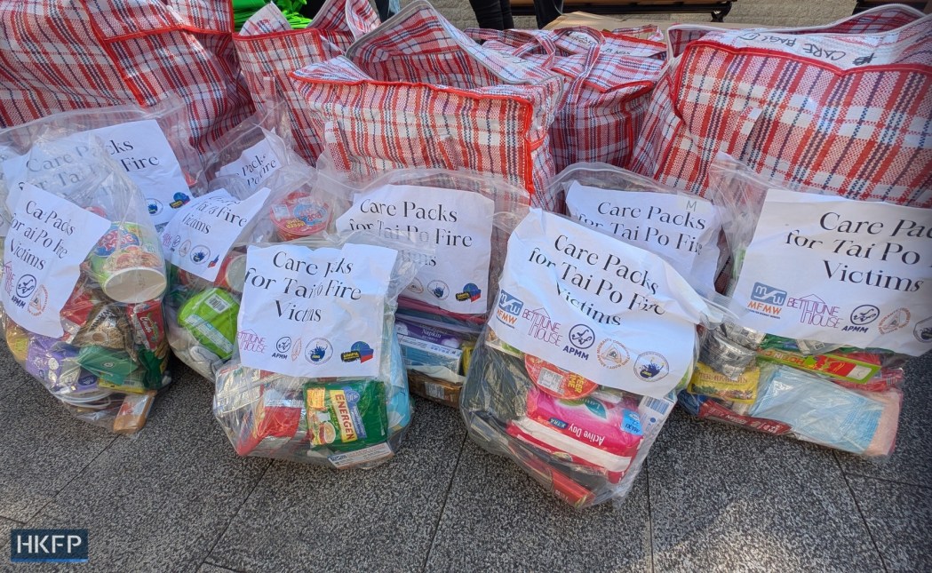 Care packs for Indonesian migrant workers who survived the Wang Fuk Court fire are distributed by the Network for Indonesian Migrant Workers (JBMI) in Tai Po on December 21, 2025. Photo: Yenni Kwok/HKFP.