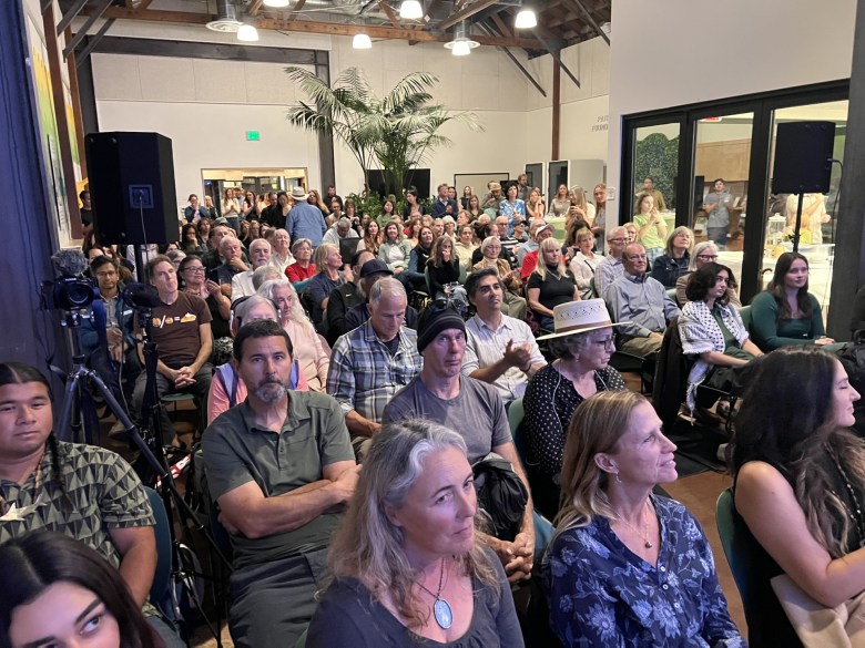 People in crowd at event to protest offshore oil drilling