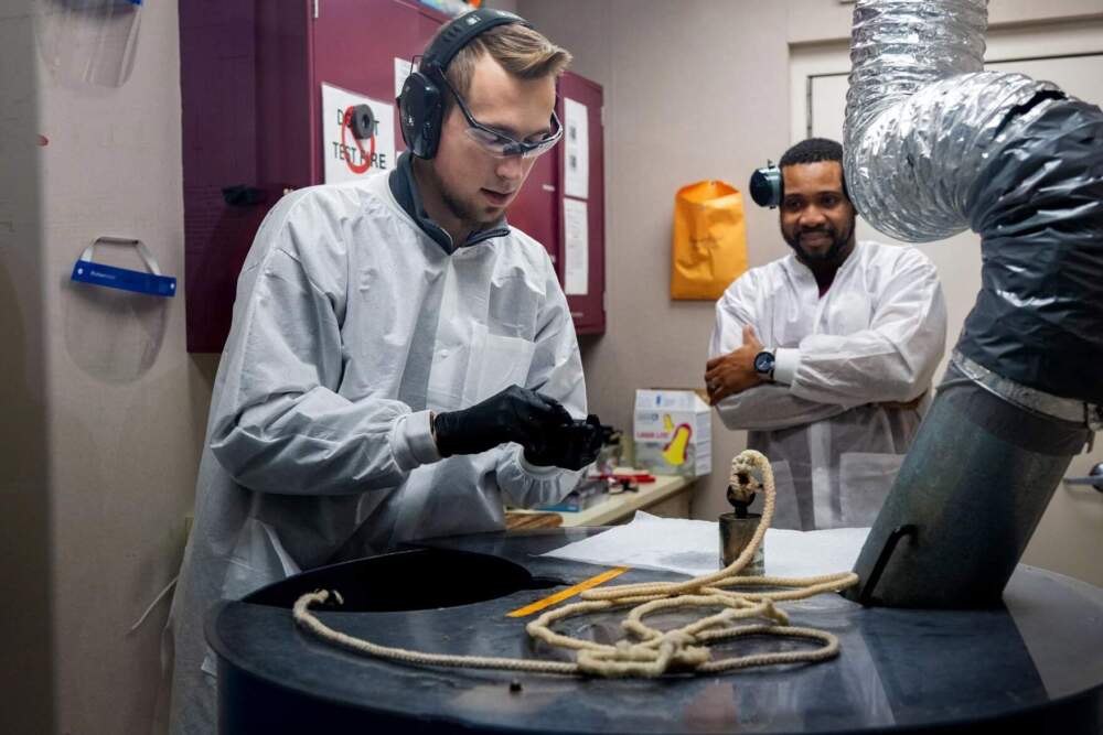 Within a room called the Firearms Tank, team members at the Connecticut Forensics Lab in Meriden analyze firearms for details like how bullet casings appear after they are fired. (Ayannah Brown/Connecticut Public)