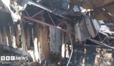 Part of an image released by the Russian-installed governor of Kherson shows a heavily damaged building with a collapsed roof