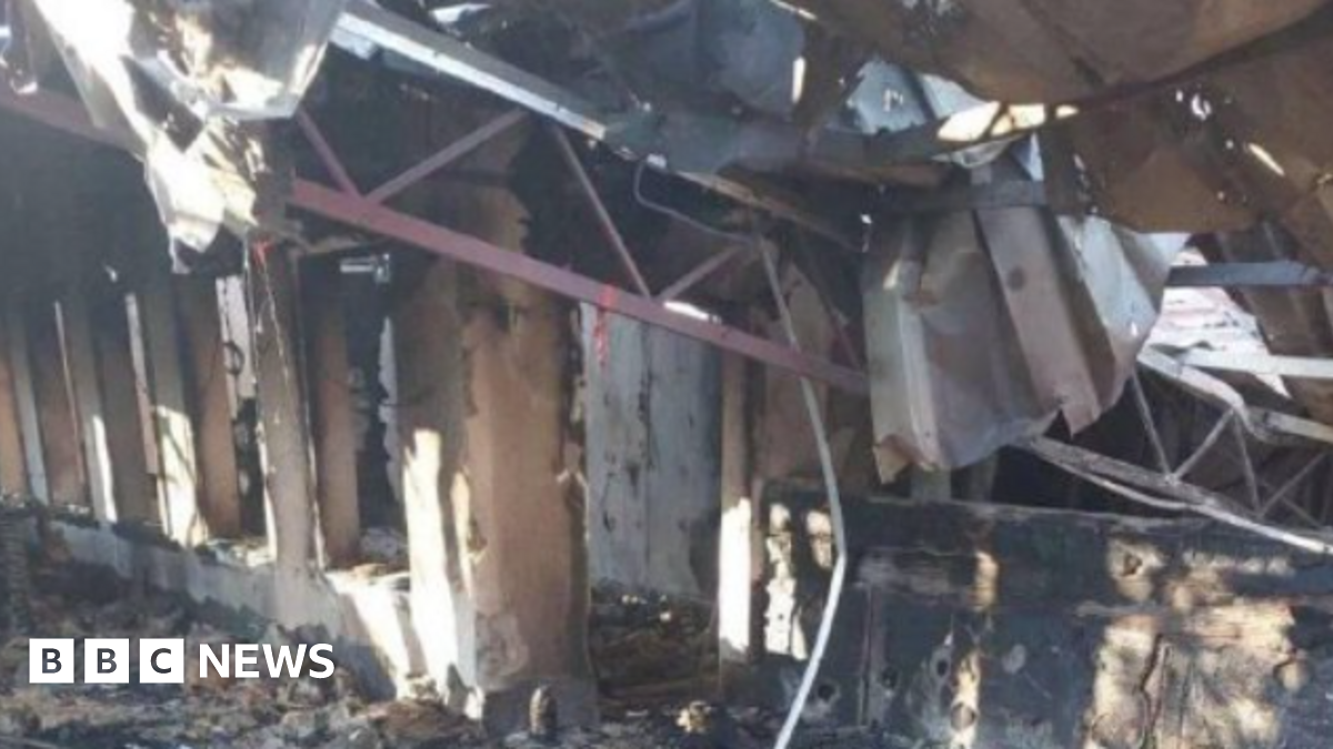 Part of an image released by the Russian-installed governor of Kherson shows a heavily damaged building with a collapsed roof