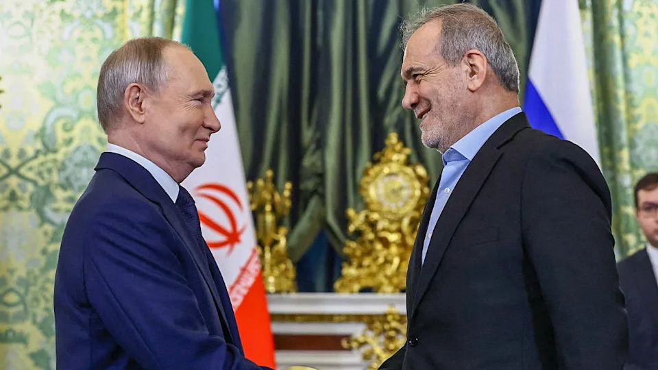 Russian President Vladimir Putin and Iranian President Masoud Pezeshkian shake hands as they meet in Moscow, Russia Jan. 17, 2025.