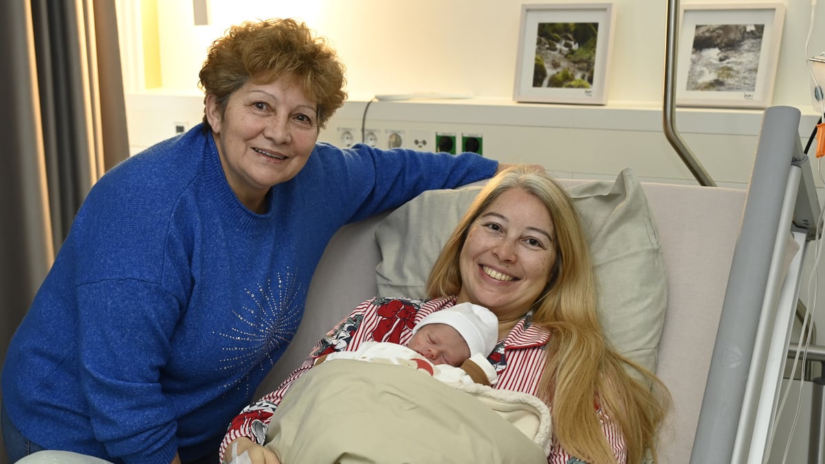 Santiago in the arms of his overjoyed mum Dina, while Santiago’s grandmother looks on with pride