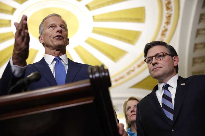 WASHINGTON, DC - OCTOBER 07: U.S. Senate Majority John Thune (R-SD) speaks alongside Speaker of the House Mike Johnson (R-LA) following the Republican Senate Policy Luncheon at the U.S. Capitol on October 07, 2025 in Washington, DC. The government remains shut down after Congress failed to reach a funding deal last week. (Photo by Kevin Dietsch/Getty Images)