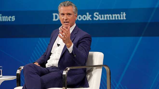 NEW YORK, NEW YORK - DECEMBER 03: (L-R) Andrew Ross Sorkin and Governor of California Gavin Newsom speak onstage during The New York Times DealBook Summit 2025 at Jazz at Lincoln Center on December 03, 2025 in New York City. (Photo by David Dee Delgado/Getty Images for The New York Times)