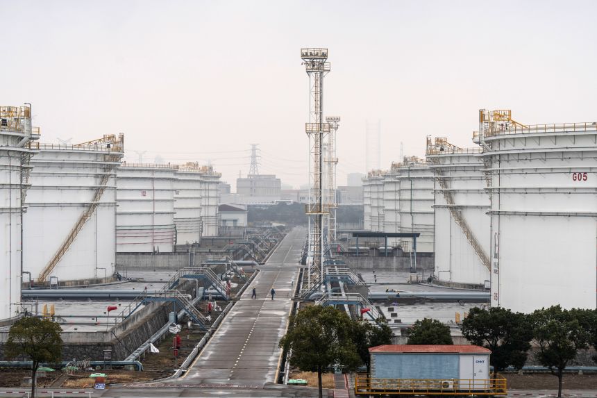 Oil storage tanks at a facility near Ningbo, China, on Monday, January 5. The US's shock intervention in Venezuela will likely choke oil flows to China, but experts told CNN that China is close to 