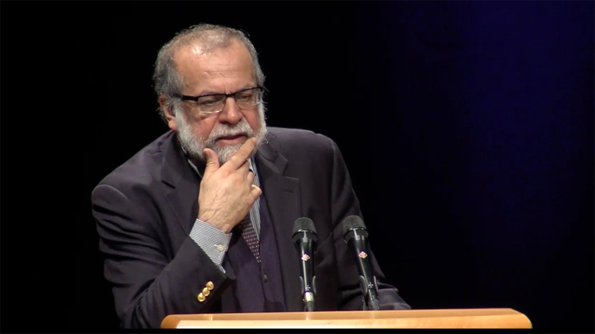 Columbia professor speaks behind lectern