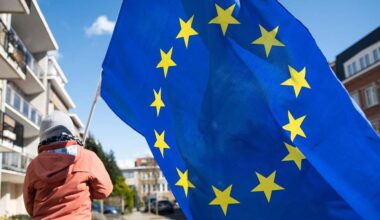A child with a European flag in Brussels.
