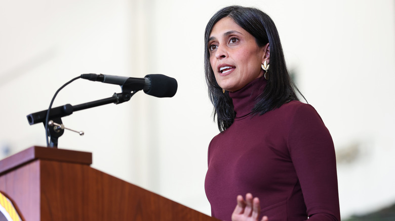 Usha Vance speaking at an event in a burgundy turtleneck