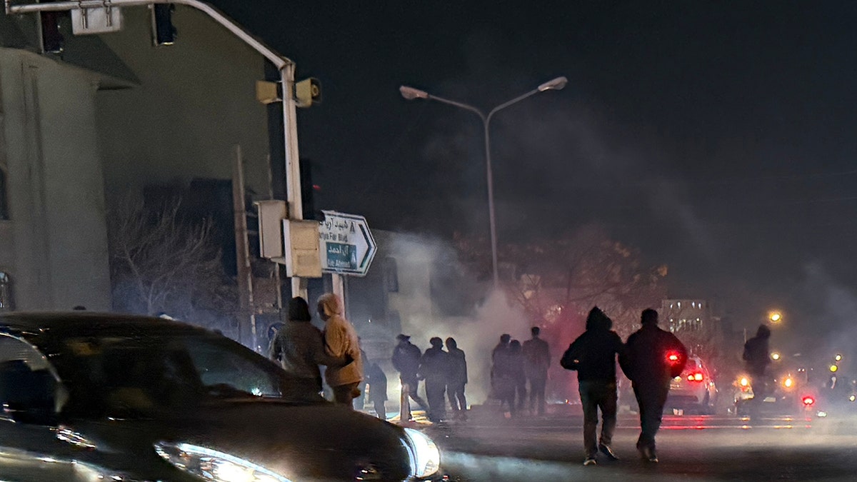 Tear gas is fired during an anti-government in Iran.