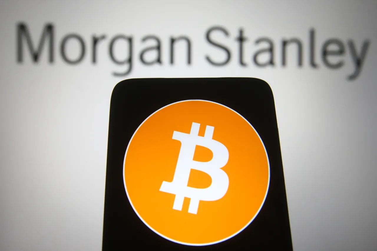 In this photo illustration, Bitcoin cryptocyrrency sign seen on a smartphone screen with the Morgan Stanley logo of US bank in the background. (Photo Illustration by Pavlo Gonchar/SOPA Images/LightRocket via Getty Images)